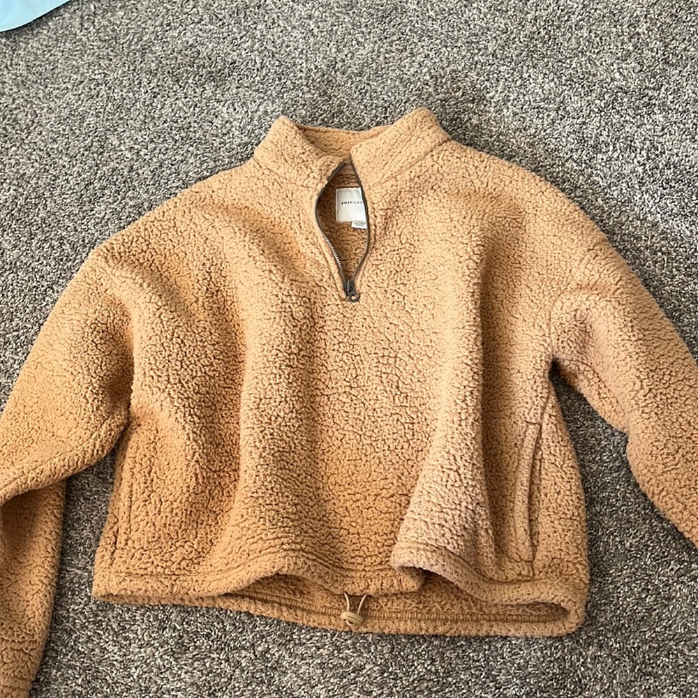 tan fuzzy pull over, size M